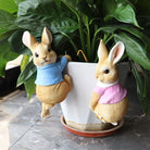 Adorable Outdoor Bunny Sculpture (Boy and Girl on plant)